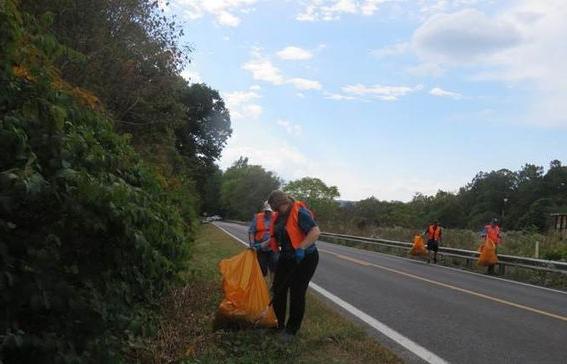 PSC Serves You Club members participated in litter cleanup during Homecoming on a three-mile stretch of the James “Aubrey” Stewart Memorial Highway near Piedmont, W.Va.  Pictured in the forefront is student, Julie Fertig. Also helping with the cleanup wa